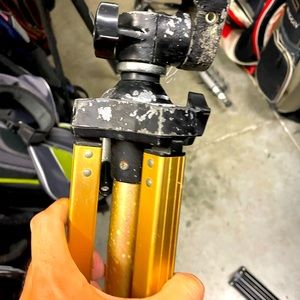 Vintage camera tripod by Coaster with extendable legs .